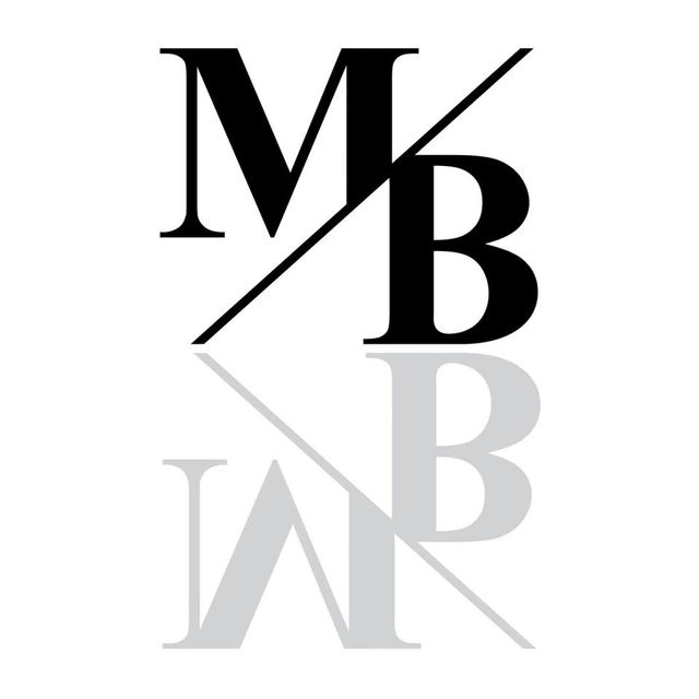 Mikko Vuojärvi, M/B-logo